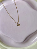 Floral cross necklace